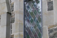 Capturestorm glazing external protective conservation of churches stained glass specalist protective water proof glass system art glass ireland