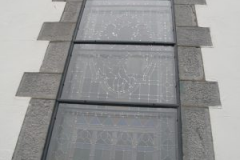 Glass stormg Glazing Church and historial building conervation heritage glass protective metal frame in Northern Ireland UK and